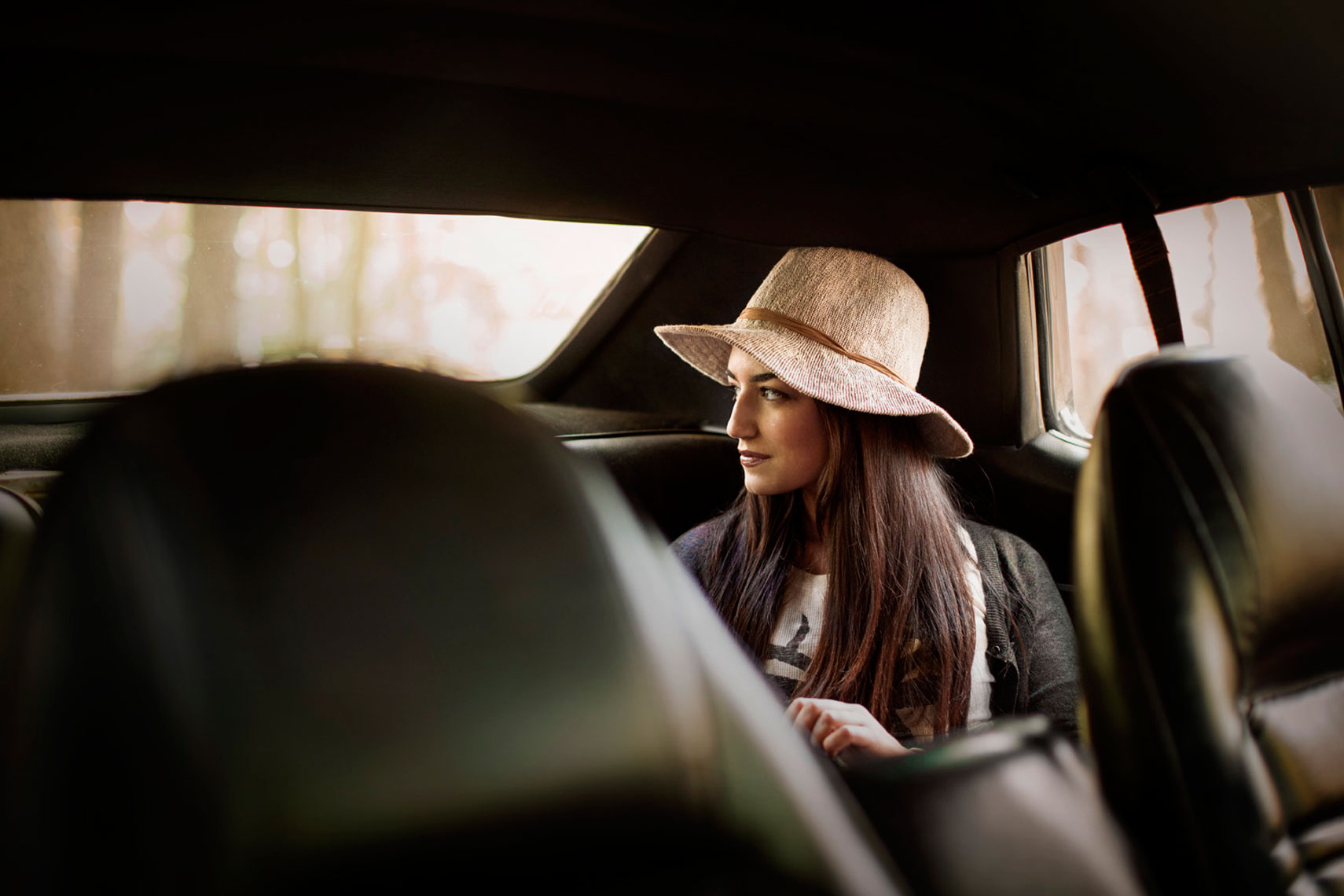 Fall Lifestyle: Young Woman in the Car Portrait: CORBIS